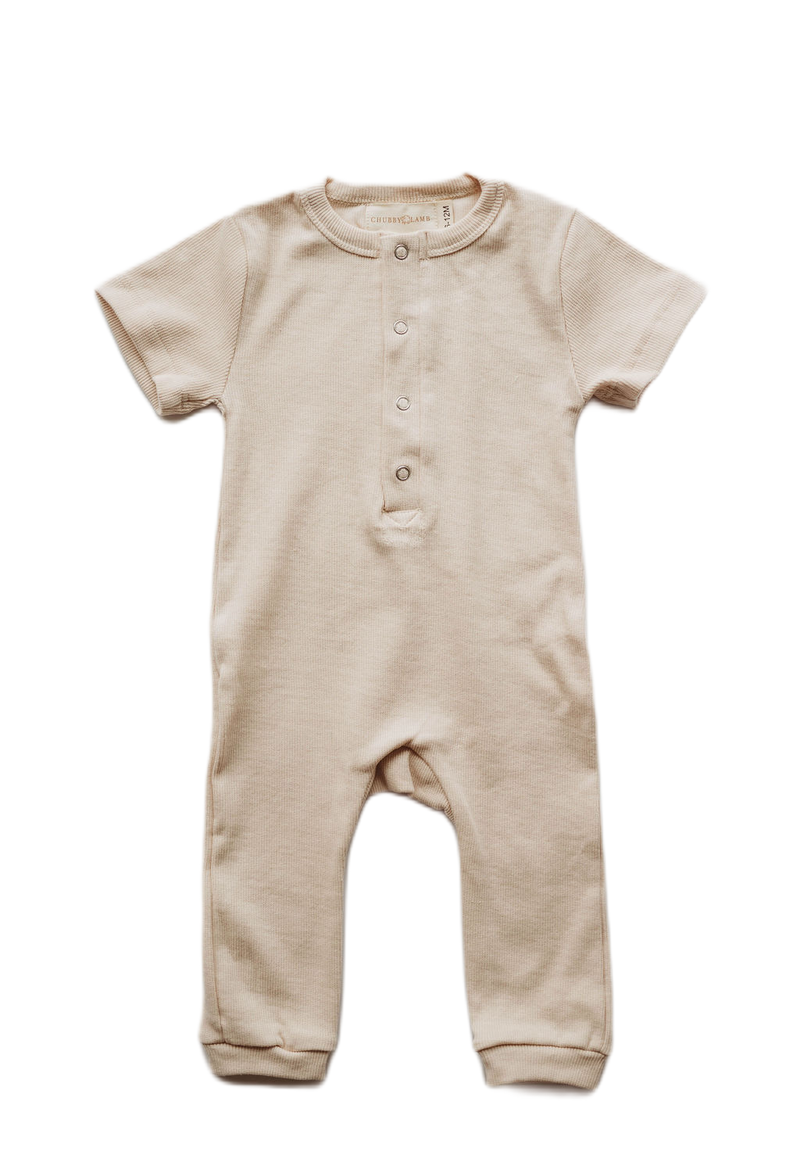 Organic cotton ribbed knit romper in "Oat"