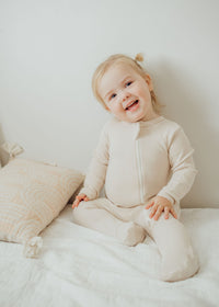 Organic cotton ribbed knit one-piece in "Oat"